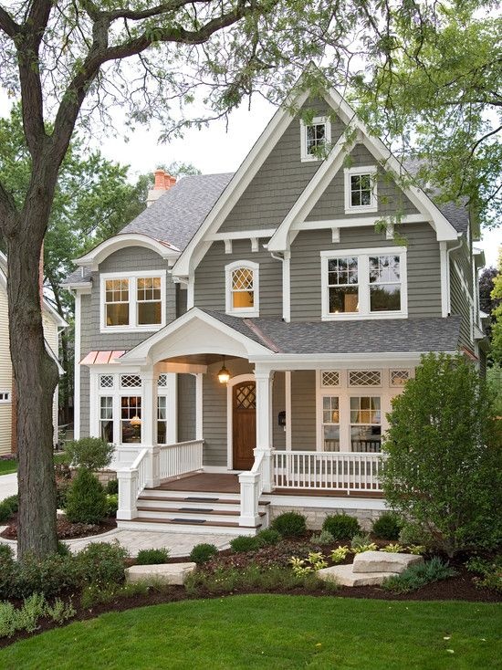 Traditional gray house with white trim and front porch